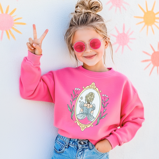 Customized hot pink youth crewneck Disney Princess Cinderella back silhouette in a gold mirror with flower vines up the side. Designs are available in Adult and youth graphic tees as well as youth and adult crewnecks and adult hoodies. 