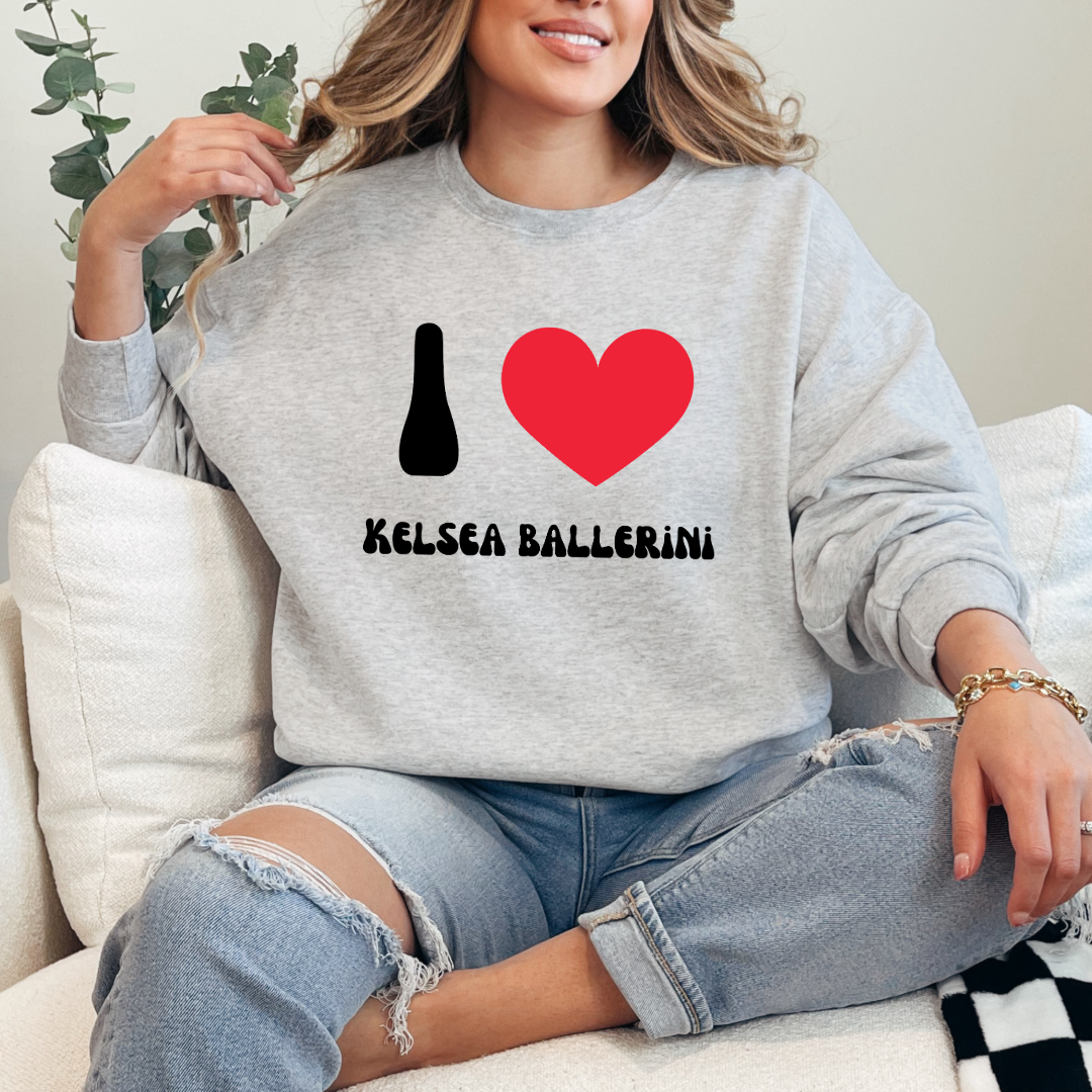 Customized Adult Grey Crewneck with black groovy bubble letters I red heart Kelsea Ballerini. Matching crewneck and hoodies available in youth and adult sizing.
