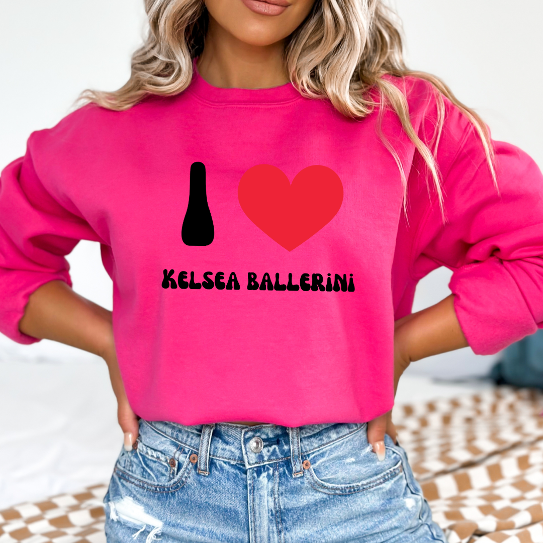Customized Adult medium hot pink Crewneck with black groovy bubble letters I red heart Kelsea Ballerini. Matching crewneck and hoodies available in youth and adult sizing.