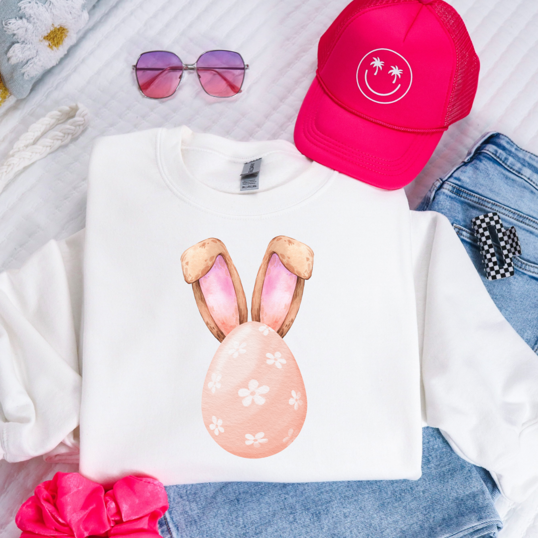 Customized youth white crewneck watercolor peach egg with white flowers and bunny ears matching tees and hoodies available In adult and youth sizes 