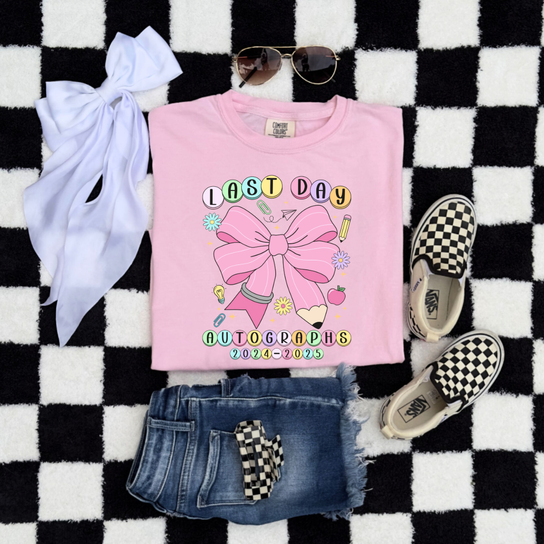 Customized youth comfort colors blossom pink flat lay last day of school  2024-2025 autographs eras tour inspired friendship bracelet beads with large pink pencil bow matching crewneck and hoodies available In adult and youth sizes.