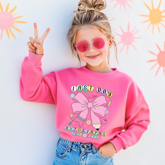 Customized youth crewneck hot pink last day of school  2024-2025 autographs eras tour inspired friendship bracelet beads with large pink pencil bow matching graphic tees and hoodies available In adult and youth sizes.