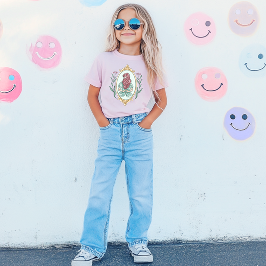 Customized youth comfort colors blossom pink Graphic tee Disney Princess Ariel back silhouette in a gold mirror with flower vines up the side. Designs are available in Adult and youth graphic tees as well as youth and adult crewnecks and adult hoodies. 