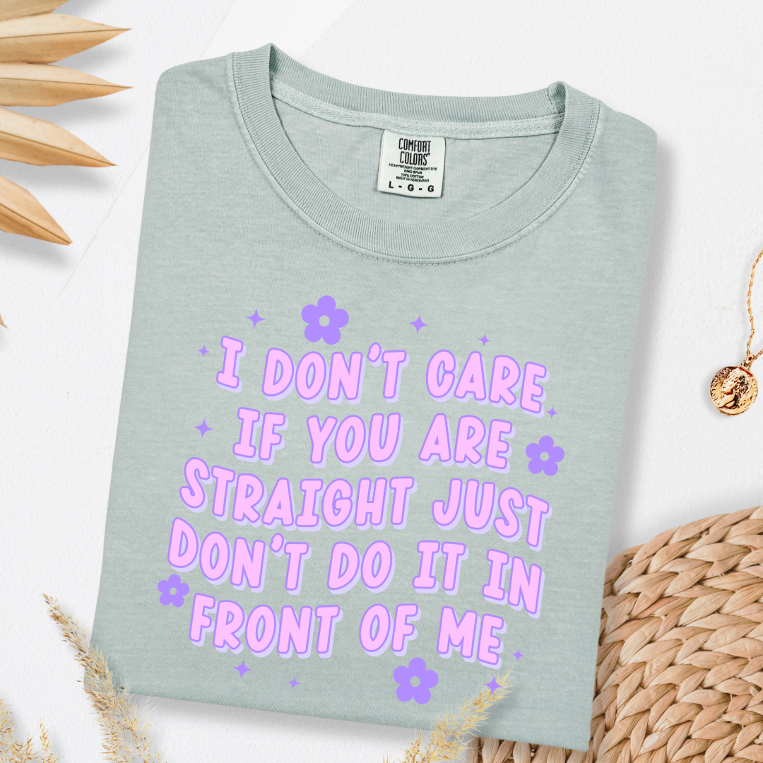 Customized Adult Comfort Colors Bay Green Graphic Tee Quoted " I don't care if you're straight just don't do it in front of me.  Purple bubble letters with flowers spread out Matching Adult Crewnecks available Perfect for Pride.