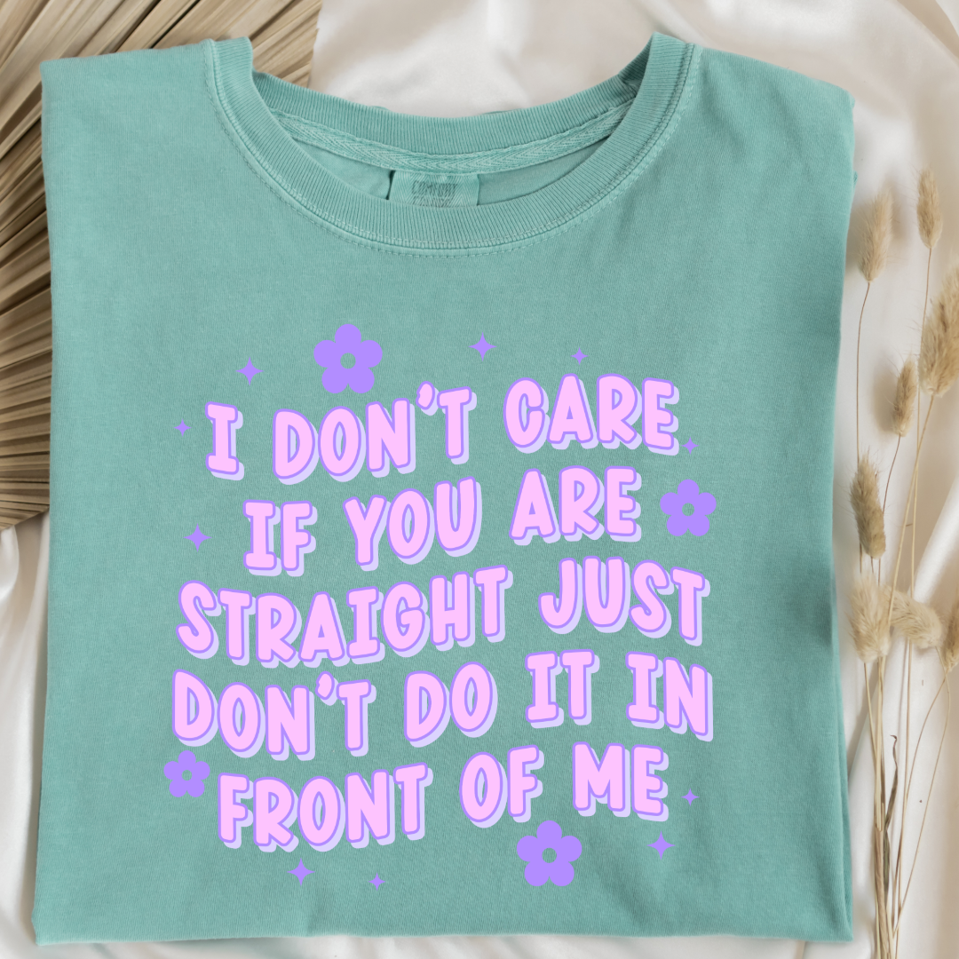 Customized Adult Comfort Colors Chalky mint Graphic Tee Quoted " I don't care if you're straight just don't do it in front of me.  Purple bubble letters with flowers spread out Matching Adult Crewnecks available Perfect for Pride.
