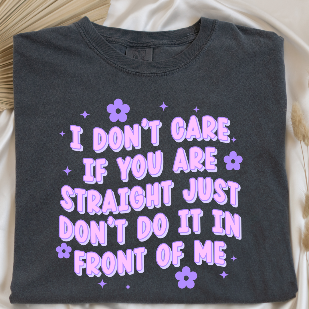 Customized Adult Comfort Colors Pepper vintage black Graphic Tee Quoted " I don't care if you're straight just don't do it in front of me.  Purple bubble letters with flowers spread out Matching Adult Crewnecks available Perfect for Pride.
