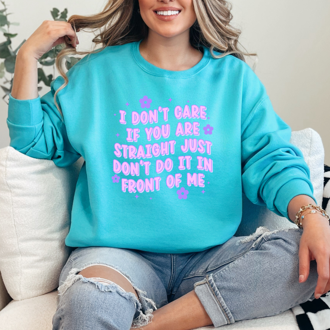 Customized Adult Comfort Colors scuba blue Graphic Tee Quoted " I don't care if you're straight just don't do it in front of me.  Purple bubble letters with flowers spread out Matching Adult graphic tees available Perfect for Pride.