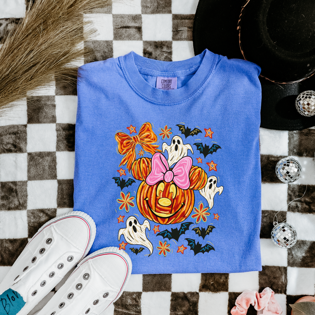 Youth Comfort Colors Flo Blue Graphic Tee with Dimensional Minnie Mouse pumpkin head with ghosts, bows and bats. This Design Is available in Youth sizes Small through XL. Mickey Mouse available as well 