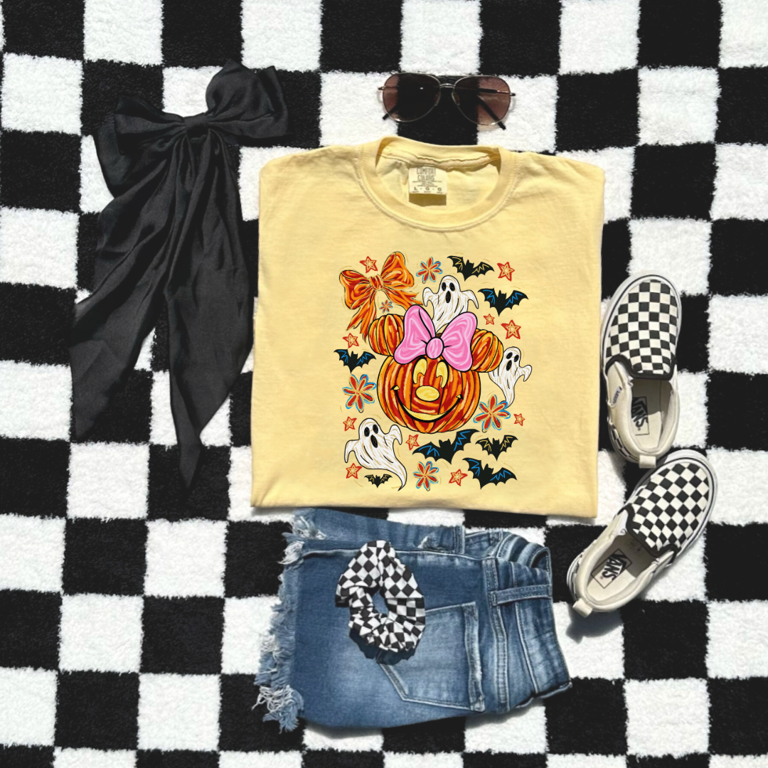 Youth Comfort Colors Butter Yellow  Graphic Tee with Dimensional Minnie Mouse pumpkin head with ghosts, bows and bats. This Design Is available in Youth sizes Small through XL. Mickey Mouse available as well 