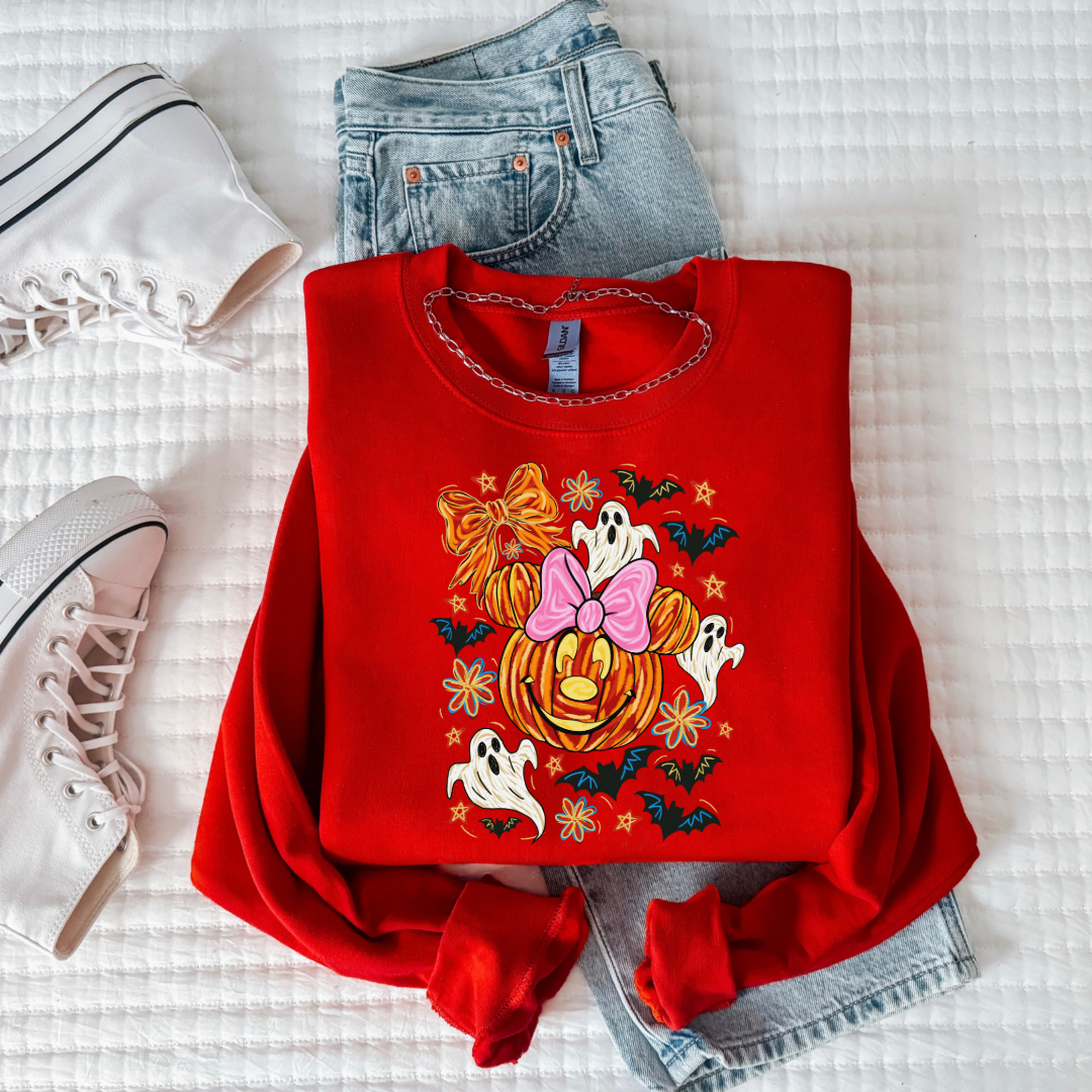 Youth Red Crewneck with Dimensional Minnie Mouse pumpkin head with ghosts, bows and bats. This Design Is available in Youth sizes Small through XL. Mickey Mouse available as well 