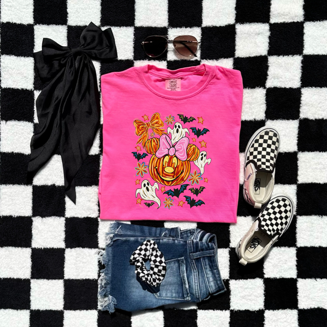 Youth Comfort Colors Neon Pink Graphic Tee with Dimensional Minnie Mouse pumpkin head with ghosts, bows and bats. This Design Is available in Youth sizes Small through XL. Mickey Mouse available as well 