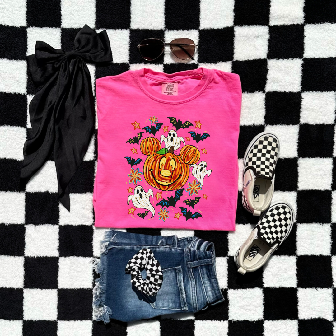 Youth Comfort Colors Neon Pink Graphic Tee with Dimensional Mickey Mouse pumpkin head with ghosts, bows and bats. This Design Is available in Youth sizes Small through XL. Minnie Mouse available as well 