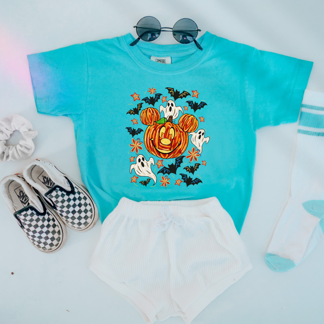 Youth Comfort Colors Lagoon Blue Graphic Tee with Dimensional Mickey Mouse pumpkin head with ghosts, bows and bats. This Design Is available in Youth sizes Small through XL. Minnie Mouse available as well 