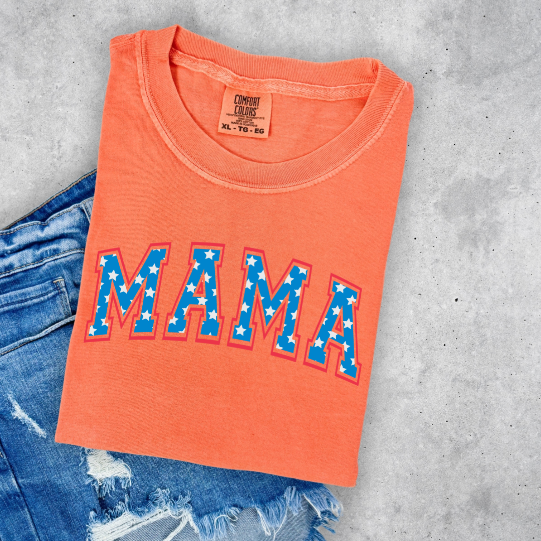 Customized adult Comfort Colors Melon Orange Graphic Tee  with Seasonal 4th of July University style Font MAMA blue with white stars outlined un red , This style is available in adult  Graphic Tees as well as adult crewnecks and hoodies .Available In DAD, MAMA and MINI. 