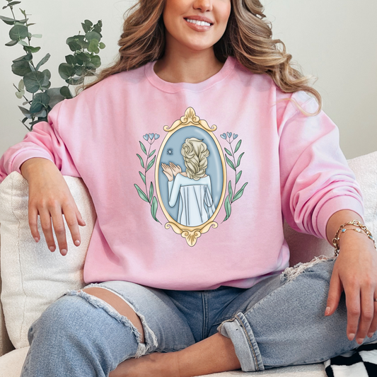 Customized adult light pink crewneck Disney Princess Elsa back silhouette in a gold mirror with flower vines up the side. Designs are available in Adult and youth graphic tees as well as youth and adult crewnecks and adult hoodies. 